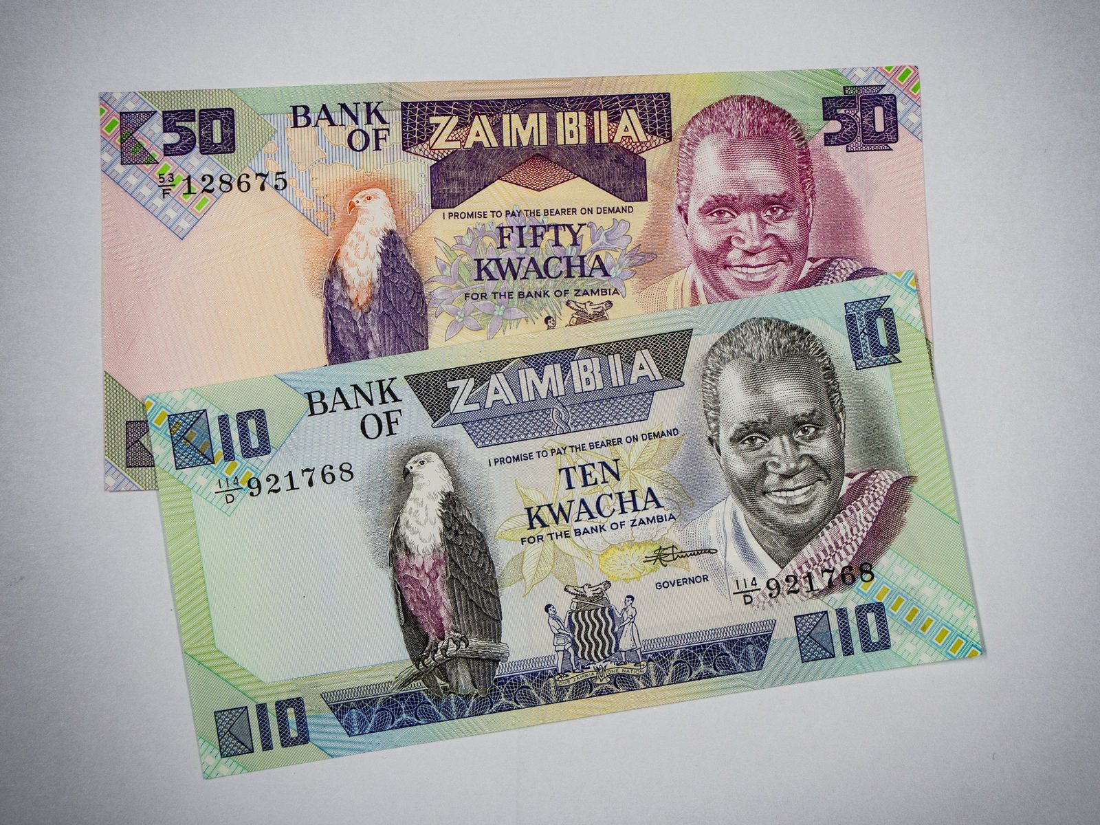 Zambian kwacha banknotes. Zambia waited two years and four months for its official creditors to agree terms under the Common Framework, and its currency traded under pressure throughout. Photo: Forextime.com via Wikimedia Commons, CC BY 2.0.